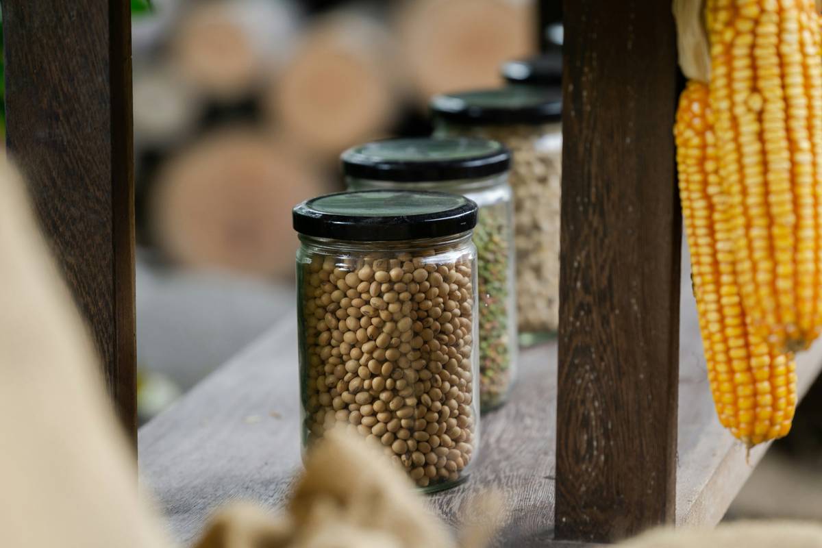 Colorful stack of reusable silicone eco home food containers on a bamboo countertop